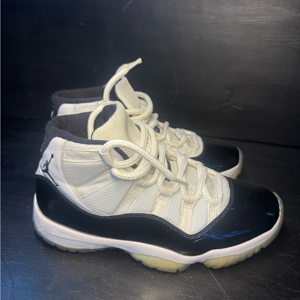 Jordan 11 White and Black High-Top Sneakers